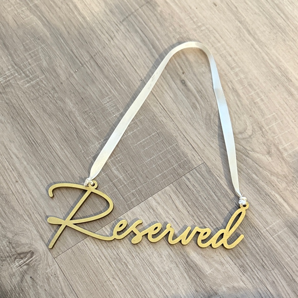 Gold 'Reserved' Sign with Ribbon